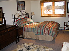 Master bedroom at Ruffed Grouse Lodge - grouse and whitetail deer hunting hunter accommodations