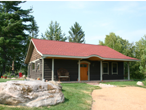 Front view of the Cottage at Elk River Farm, part of Ruffed Grouse Lodge accommodations in Phillips, WI