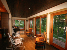 The Cottage at Elk River Farm porch pic at Ruffed Grouse Lodge in Price County Wisconsin